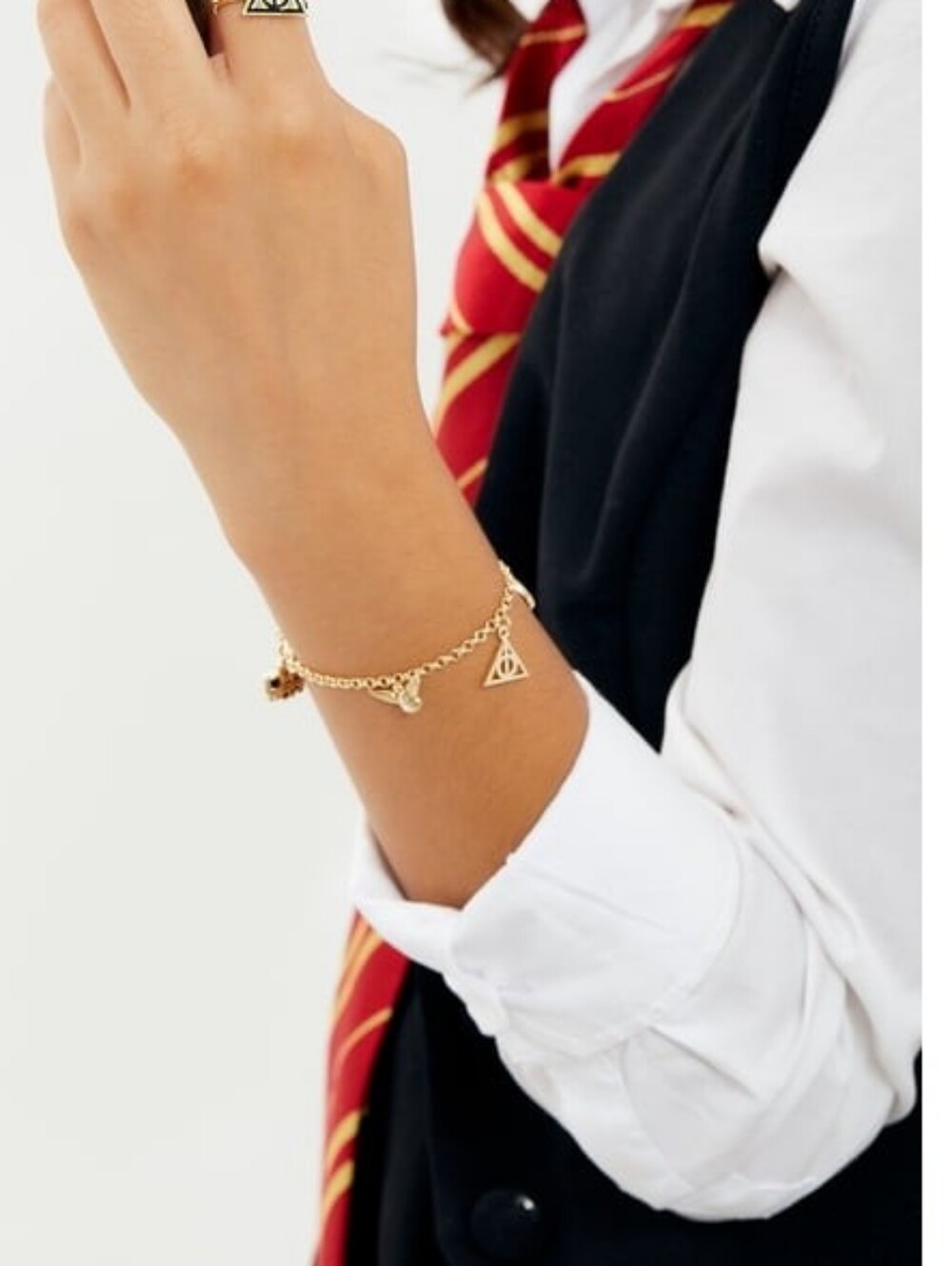 Harry Potter gold-tone charm bracelet collection iconic wizarding World Motifs